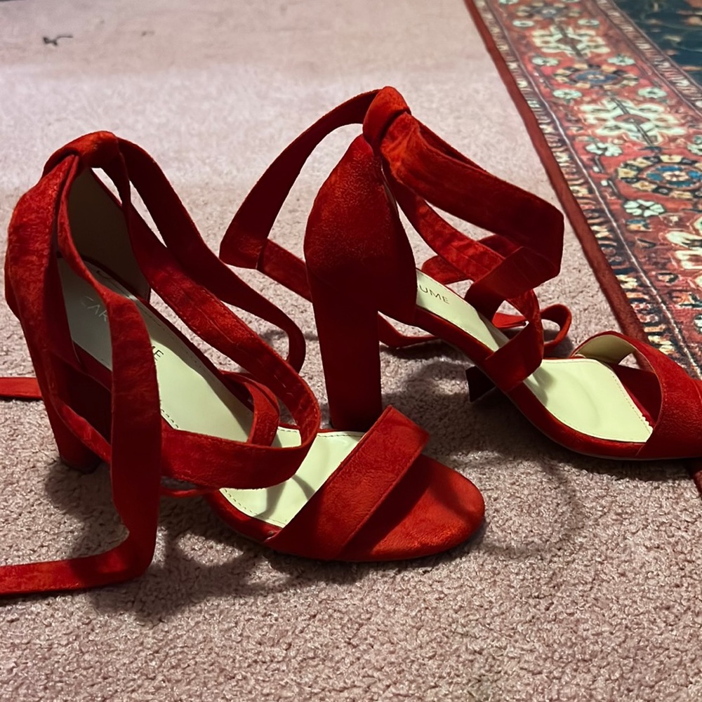 Red heels with bow.